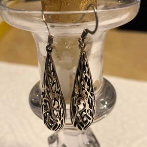 Gorgeous cutout silver earrings.